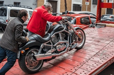 Man Towing his Motrcycle