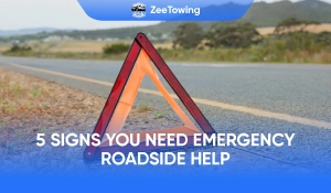 reflective warning triangle placed on roadside during vehicle breakdown
